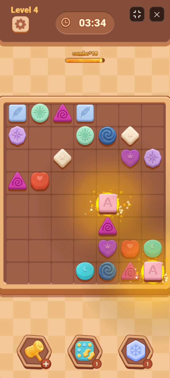 CANDY MATCH MOVE Hammer booster automatically destroying a matching pair of candy tiles