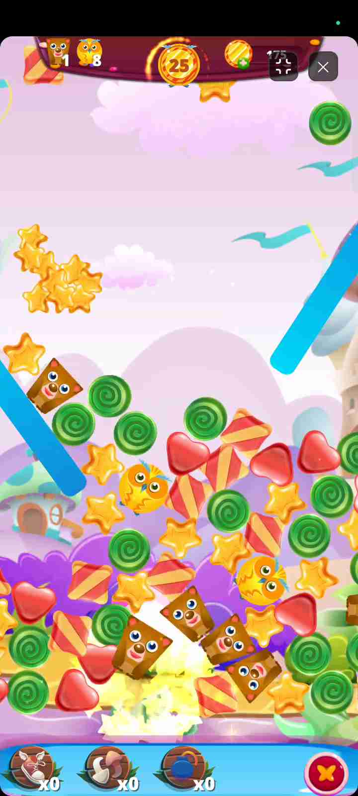 Strategic blasting to drop the dolls to the bottom of the puzzle board